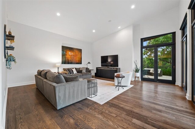 9517 Veletta Pl, Austin, TX 78735 - living area featuring high vaulted ceiling, dark wood finished floors, recessed lighting, and baseboards