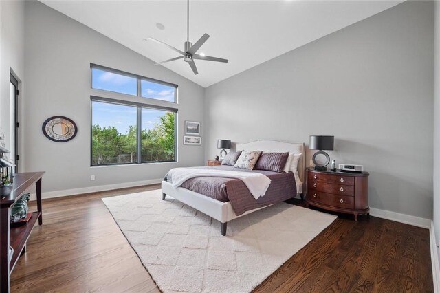 9517 Veletta Pl, Austin, TX 78735 - bedroom featuring high vaulted ceiling, wood finished floors, baseboards, and a ceiling fan