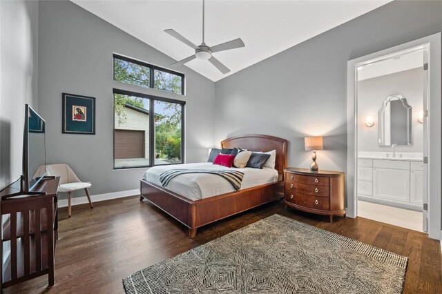 9517 Veletta Pl, Austin, TX 78735 - bedroom featuring high vaulted ceiling, wood finished floors, a sink, ensuite bath, and baseboards