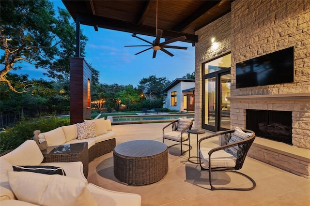 9517 Veletta Pl, Austin, TX 78735 - view of patio / terrace featuring a ceiling fan, an outdoor pool, and an outdoor living space with a fireplace