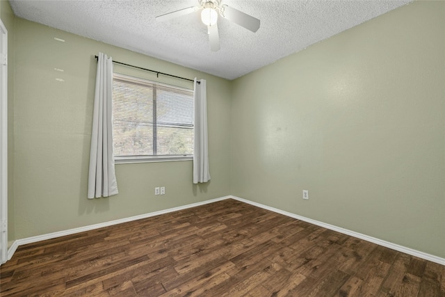 4700 Fallenash Dr, Austin, TX 78725 - spare room with a textured ceiling, wood finished floors, ceiling fan, and baseboards