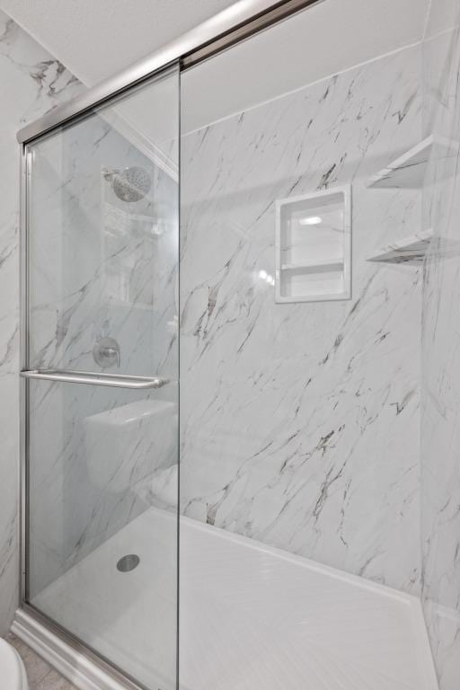 3102 Glen Ora St Unit 102, Austin, TX 78704 - full bath featuring a marble finish shower