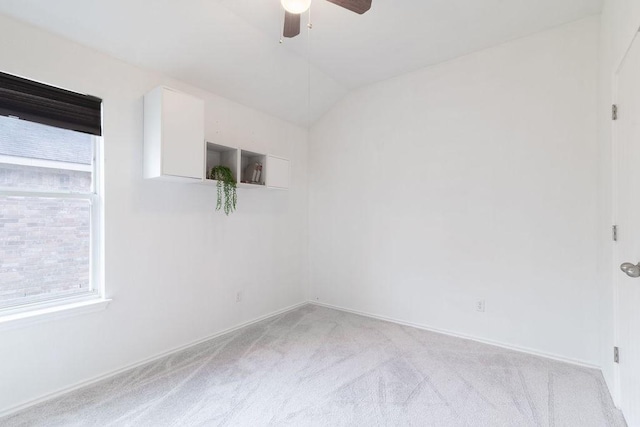1310 Rainbow Parke Dr, Round Rock, TX 78665 - unfurnished room featuring healthy amount of natural light, ceiling fan, light carpet, and vaulted ceiling