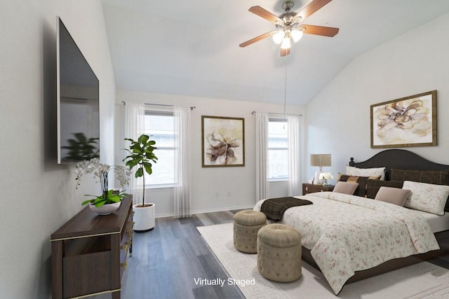 1310 Rainbow Parke Dr, Round Rock, TX 78665 - bedroom featuring vaulted ceiling, wood finished floors, multiple windows, and a ceiling fan