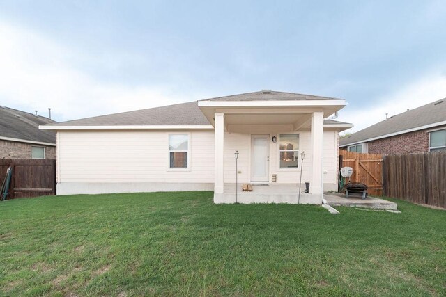 1310 Rainbow Parke Dr, Round Rock, TX 78665 - back of house with a fenced backyard and a patio