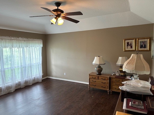145 Turkey Run, Meadowlakes, TX 78654 - interior space with dark wood-style floors, vaulted ceiling, baseboards, and ceiling fan