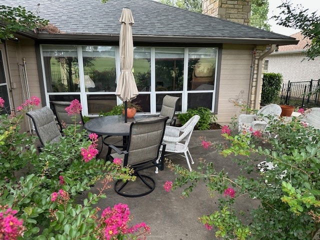 145 Turkey Run, Meadowlakes, TX 78654 - view of patio featuring outdoor dining space