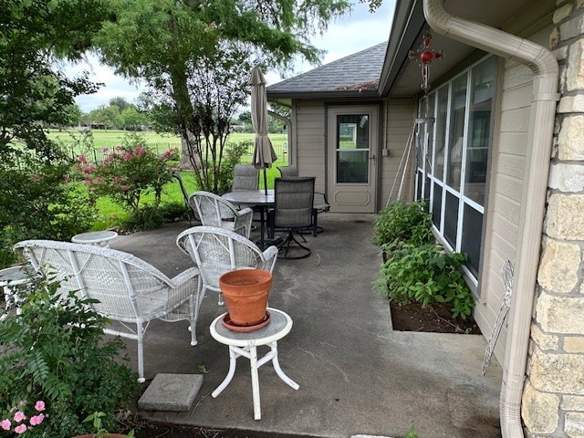 145 Turkey Run, Meadowlakes, TX 78654 - view of patio / terrace featuring outdoor dining space