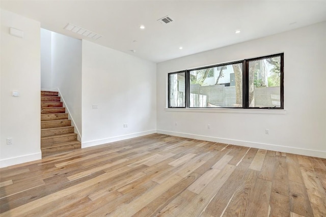 3208 Clawson Rd Unit 3A, Austin, TX 78704 - unfurnished room with light wood finished floors, stairs, and recessed lighting
