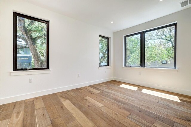 3208 Clawson Rd Unit 3A, Austin, TX 78704 - unfurnished room featuring light wood-style flooring and recessed lighting