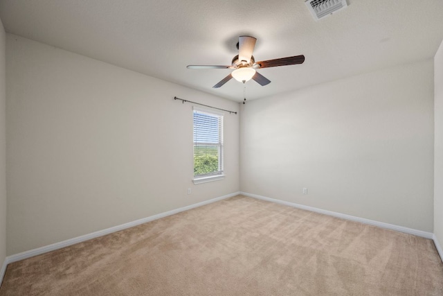 5406 Traviston Dr, Austin, TX 78738 - unfurnished room featuring light carpet, a ceiling fan, and baseboards