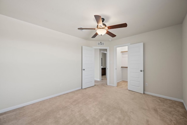 5406 Traviston Dr, Austin, TX 78738 - unfurnished bedroom with light colored carpet, a spacious closet, baseboards, and a closet
