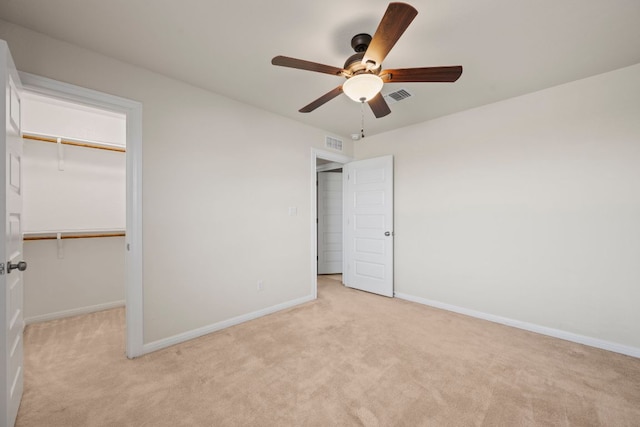 5406 Traviston Dr, Austin, TX 78738 - unfurnished bedroom featuring light carpet, a closet, baseboards, and a spacious closet