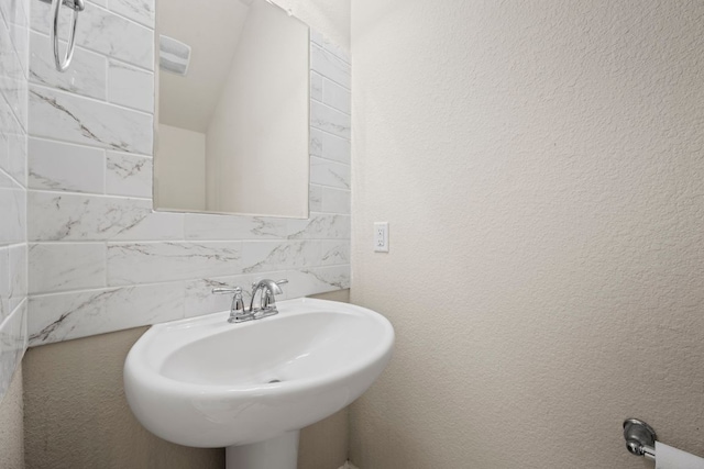 5406 Traviston Dr, Austin, TX 78738 - bathroom with a sink and decorative backsplash