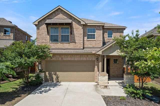 5406 Traviston Dr, Austin, TX 78738 - view of front facade featuring concrete driveway, brick siding, an attached garage, and a shingled roof