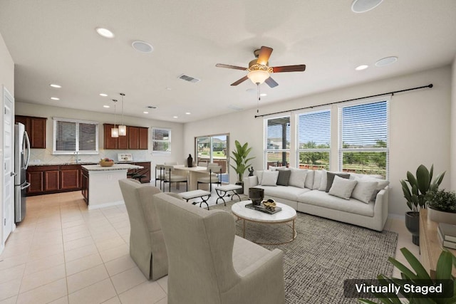 5406 Traviston Dr, Austin, TX 78738 - living room featuring recessed lighting, light tile patterned floors, and a ceiling fan