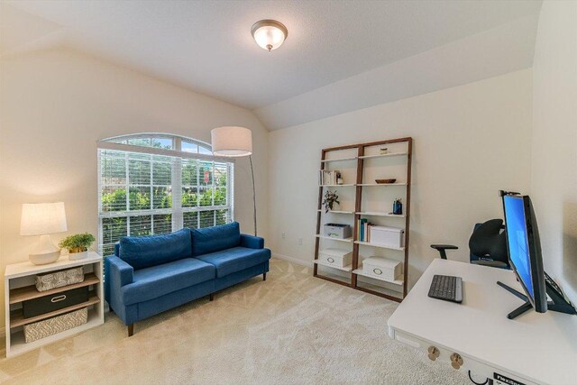 9424 Sawyer Fay Ln, Austin, TX 78748 - office area featuring lofted ceiling, carpet floors, and baseboards