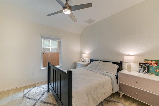 9424 Sawyer Fay Ln, Austin, TX 78748 - bedroom featuring carpet floors, vaulted ceiling, ceiling fan, and baseboards