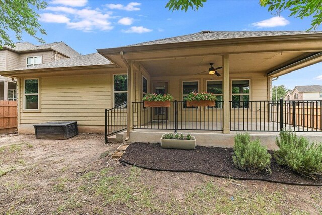 9424 Sawyer Fay Ln, Austin, TX 78748 - rear view of house with ceiling fan and roof with shingles