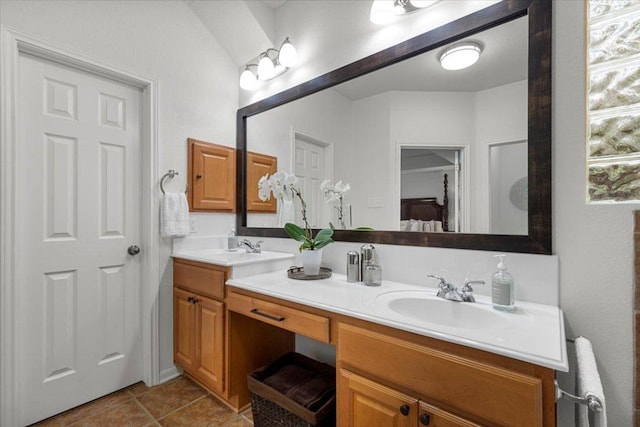 12501 Bright Sky Overlook, Austin, TX 78732 - ensuite bathroom with double vanity and tile patterned floors