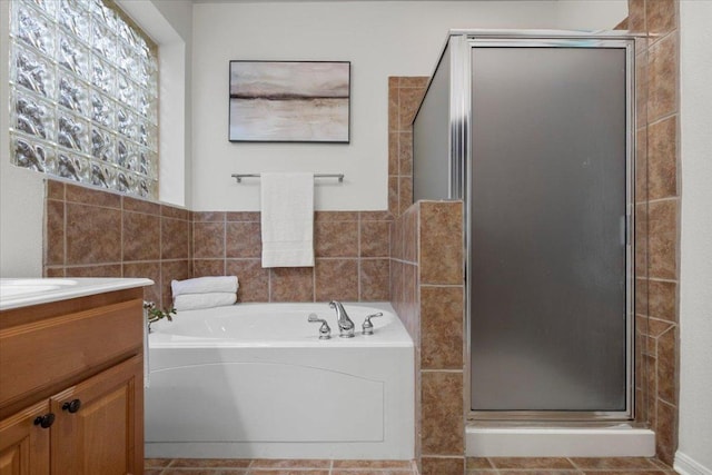 12501 Bright Sky Overlook, Austin, TX 78732 - full bathroom with a shower stall, vanity, and a bath