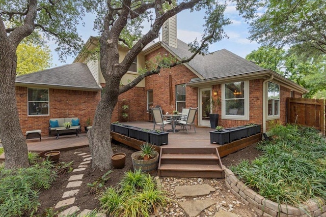 12501 Bright Sky Overlook, Austin, TX 78732 - rear view of house with brick siding, an outdoor living space, a deck, and a chimney