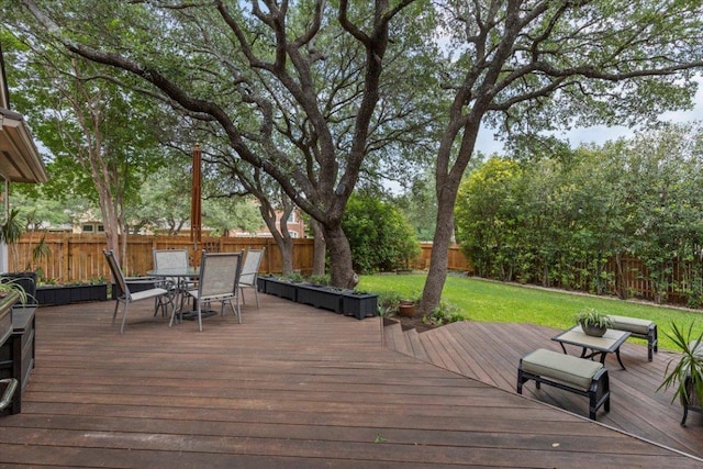 12501 Bright Sky Overlook, Austin, TX 78732 - wooden terrace featuring a fenced backyard and outdoor dining space