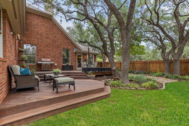 12501 Bright Sky Overlook, Austin, TX 78732 - fenced backyard featuring a wooden deck