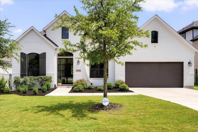 482 Running Bird Rd, Austin, TX 78737 - french country inspired facade featuring a front yard and concrete driveway