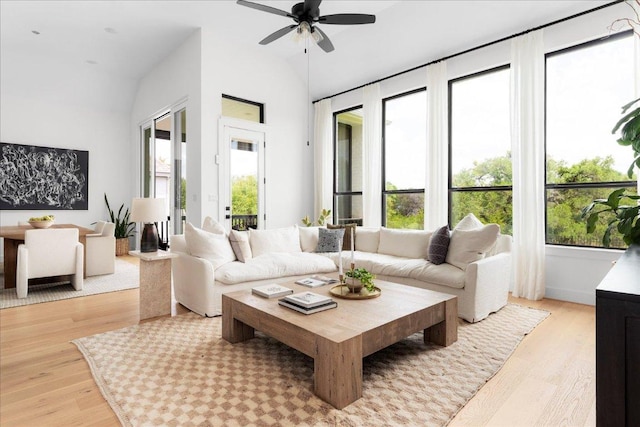482 Running Bird Rd, Austin, TX 78737 - living area featuring light wood-type flooring, a ceiling fan, and vaulted ceiling