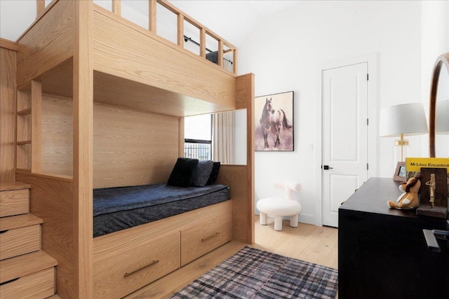482 Running Bird Rd, Austin, TX 78737 - bedroom with wood finished floors and lofted ceiling