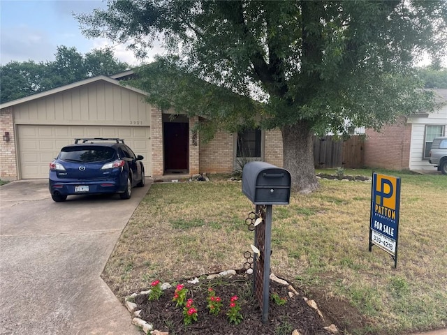 3921 Leafield Dr, Austin, TX 78749 - single story home featuring brick siding, concrete driveway, and an attached garage