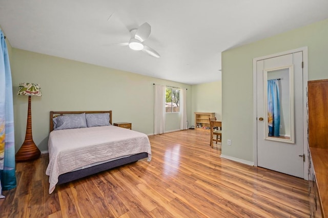 3921 Leafield Dr, Austin, TX 78749 - bedroom with wood finished floors, a ceiling fan, and baseboards