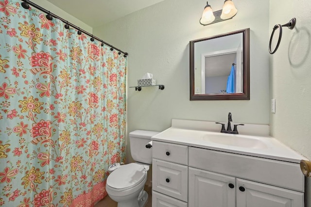 3921 Leafield Dr, Austin, TX 78749 - bathroom featuring vanity, toilet, and curtained shower