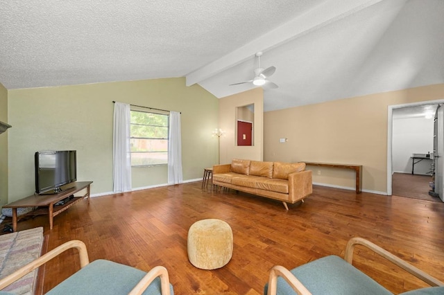 3921 Leafield Dr, Austin, TX 78749 - living area with wood finished floors, a ceiling fan, and a textured ceiling
