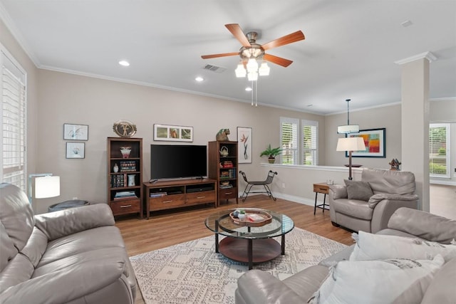 2125 Village View Loop, Pflugerville, TX 78660 - living area featuring crown molding, ceiling fan, light wood-type flooring, baseboards, and recessed lighting