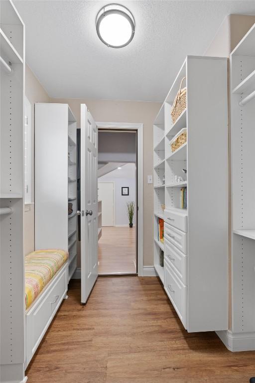 2125 Village View Loop, Pflugerville, TX 78660 - walk in closet with light wood finished floors