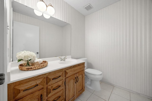 11512 Tin Cup Dr Unit 103, Austin, TX 78750 - bathroom with vanity, tile patterned flooring, and wallpapered walls