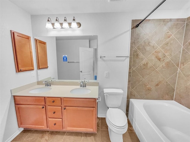 2015 Split Diamond Way, Round Rock, TX 78664 - bathroom featuring double vanity, toilet, baseboards, shower / bathtub combination, and tile patterned flooring
