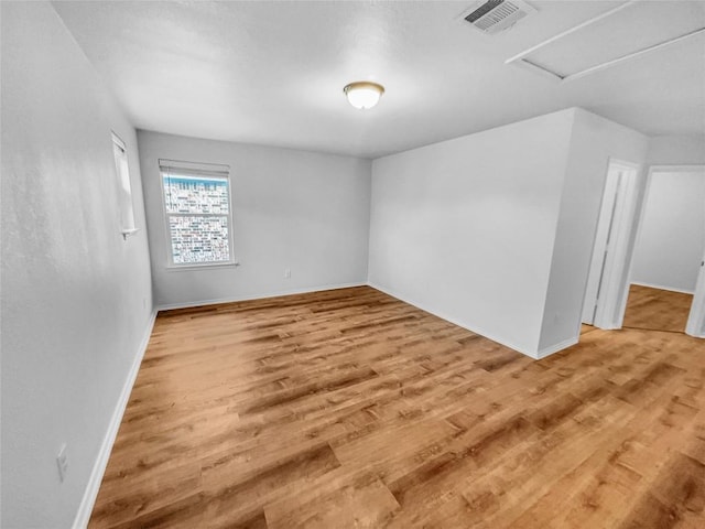 2015 Split Diamond Way, Round Rock, TX 78664 - spare room with light wood-type flooring and baseboards