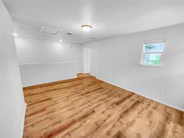 2015 Split Diamond Way, Round Rock, TX 78664 - empty room with attic access, wood finished floors, and baseboards