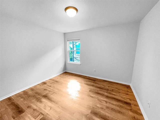 2015 Split Diamond Way, Round Rock, TX 78664 - empty room with wood finished floors and baseboards