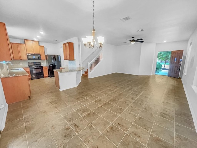 2015 Split Diamond Way, Round Rock, TX 78664 - kitchen featuring black appliances, open floor plan, a ceiling fan, light tile patterned floors, and recessed lighting