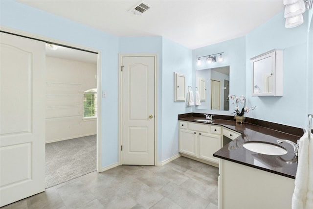 1113 Red Ranch Cir, Cedar Park, TX 78613 - full bath featuring two vanities and baseboards