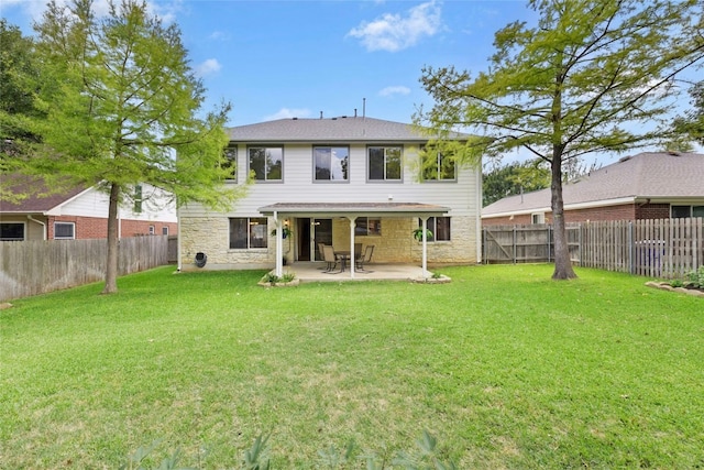 1113 Red Ranch Cir, Cedar Park, TX 78613 - back of property with stone siding and a patio area