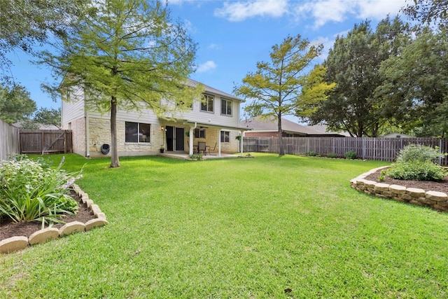 1113 Red Ranch Cir, Cedar Park, TX 78613 - back of property with stone siding and a patio