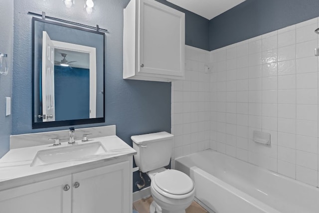 14517 Harris Ridge Blvd Unit B, Pflugerville, TX 78660 - bathroom featuring vanity, toilet,  shower combination, and a ceiling fan