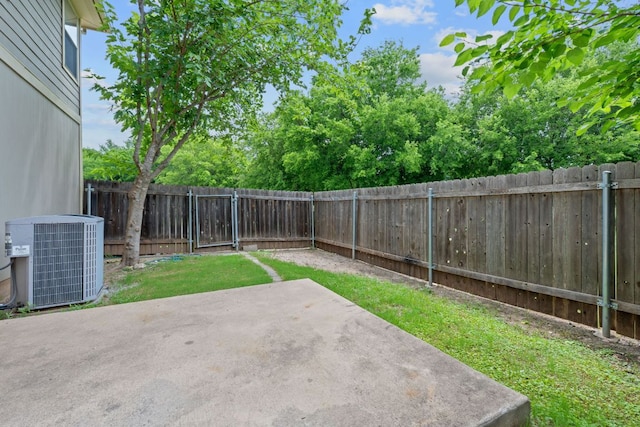 14517 Harris Ridge Blvd Unit B, Pflugerville, TX 78660 - fenced backyard with central AC and a patio