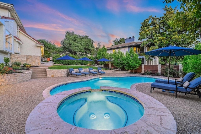 22 Wingreen Loop, The Hills, TX 78738 - view of swimming pool featuring a pool with connected hot tub