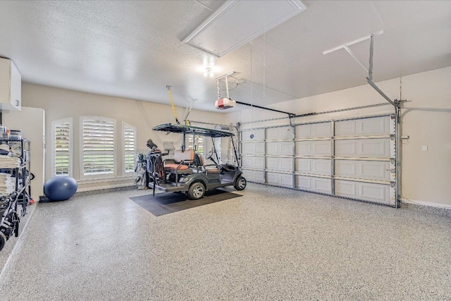 22 Wingreen Loop, The Hills, TX 78738 - garage featuring baseboards